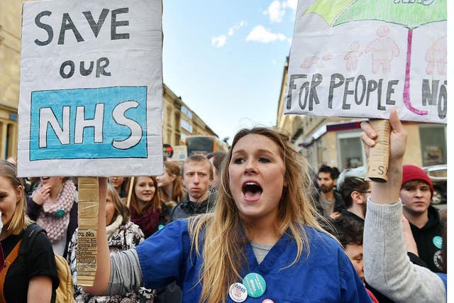 Junior doctors and supporters rally through the city centre during an all-out strike on April 26, 2016 in Bristol, England