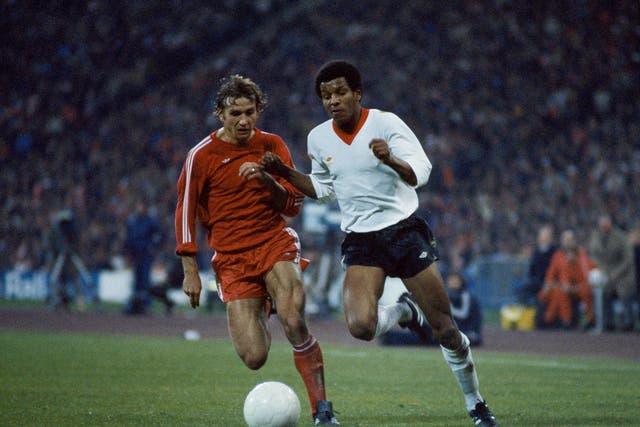 Howard Gayle storms past Wolfgang Dremmler in the second-leg of Liverpool's semi-final clash against Bayern Munich in the European Cup, April 1981 (Getty)