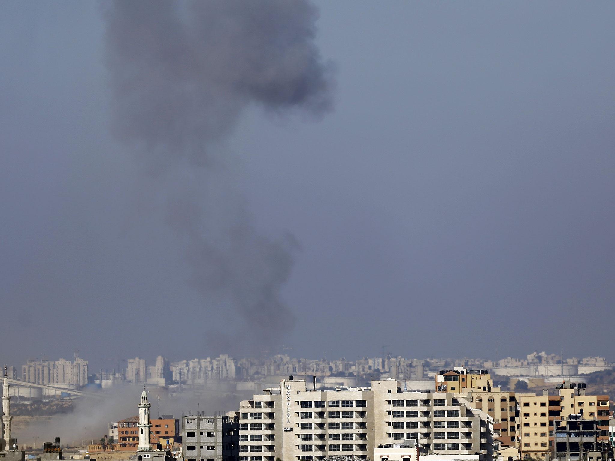 Smoke raises from western Gaza City following an Israeli air strike