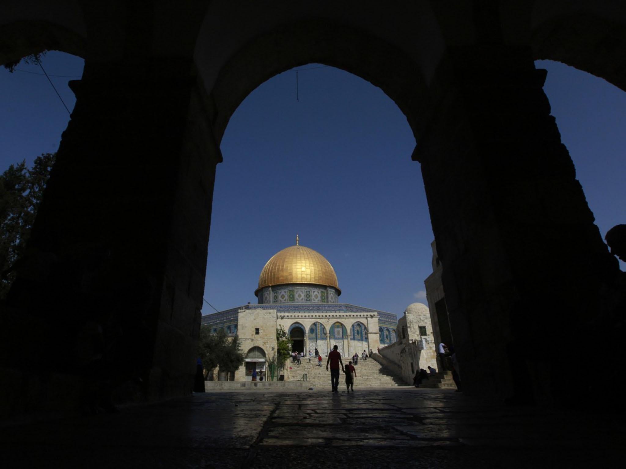 Palestinians make their way to pray in the Dome of the Rock on Temple Mount in Jerusalem
