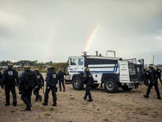French police accused of ‘stealing phones and shoes of refugees to stop them leaving Calais Jungle’