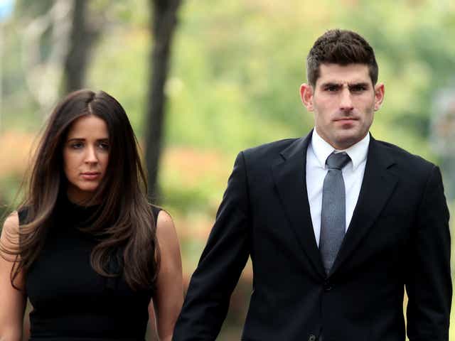 Footballer Ched Evans and partner Natasha Massey arrive at Cardiff Crown Court