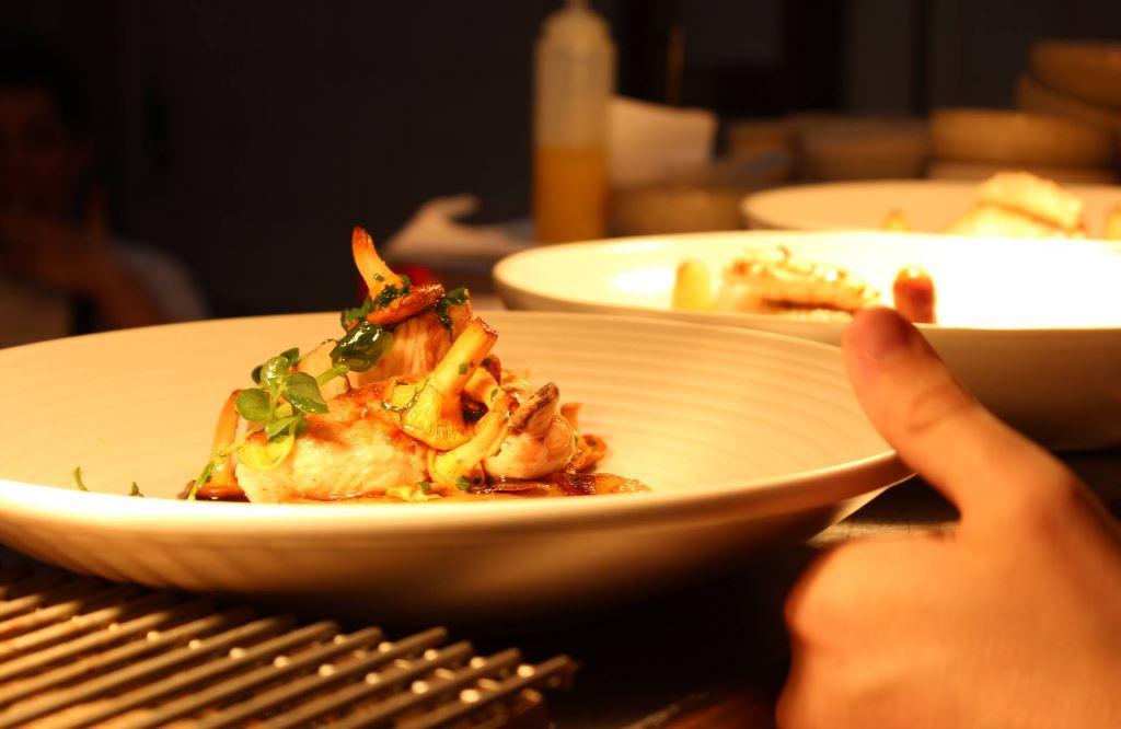 Cail Bruich's breast of chicken with boulangère potatoes, peas and chanterelle mushrooms