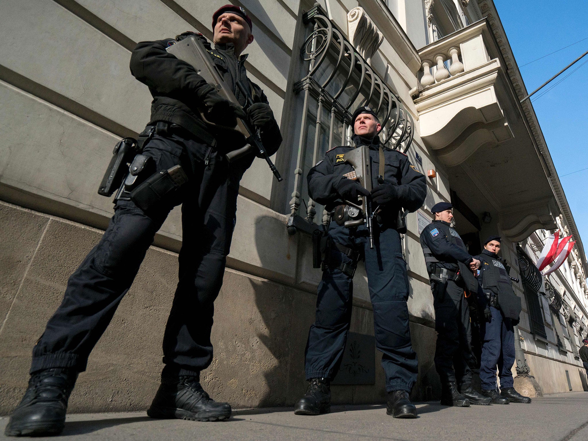 Austrian police officers guard the entrance to the West-Balkan conference 'Managing Migration together' at the Austrian interior ministry in Vienna, Austria on February 24, 2016.