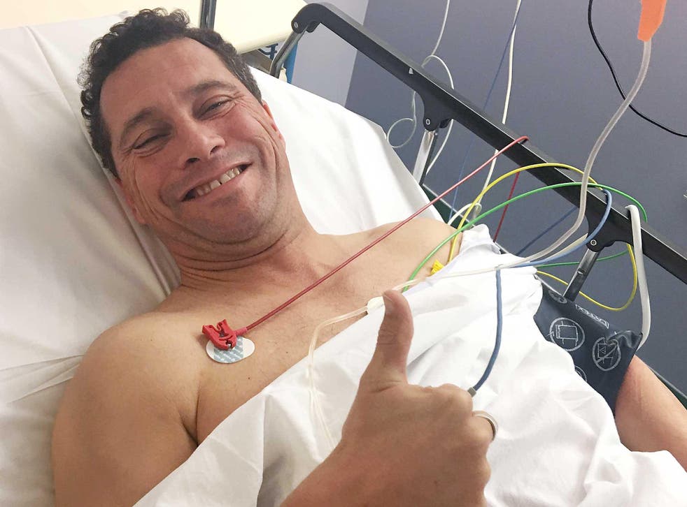 Leadership favourite Steven Woolfe smiles from his hospital bed after his 'altercation' with another Ukip MEP