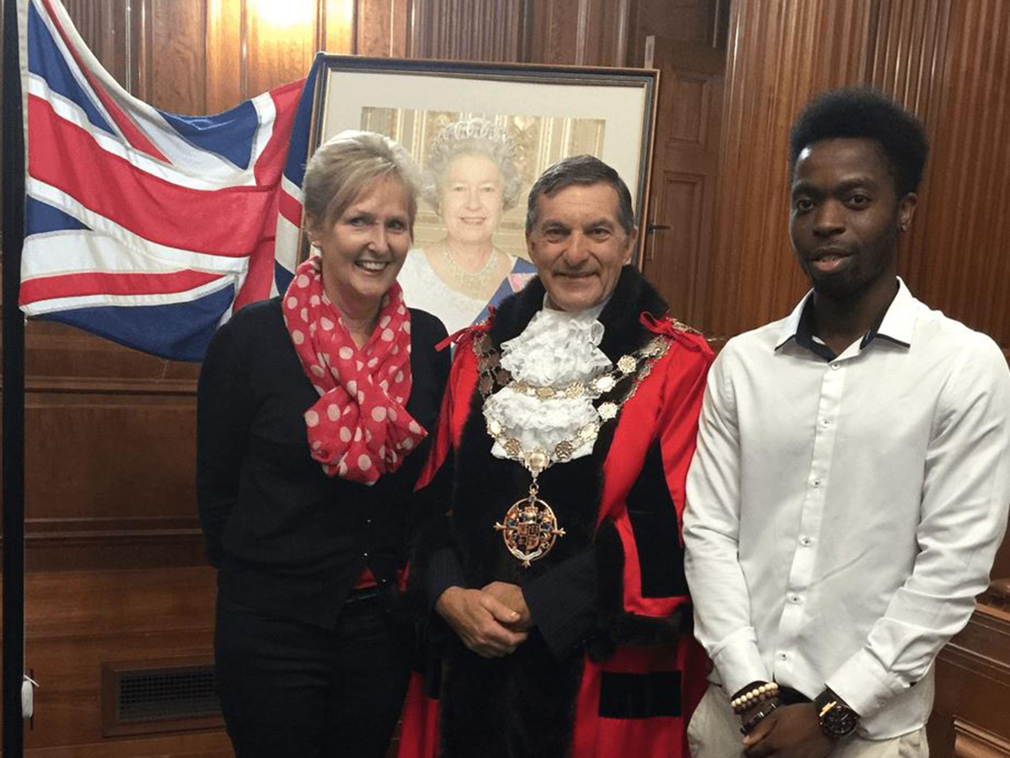 Tunde Jaji with his old teacher and the mayor of Bournemouth