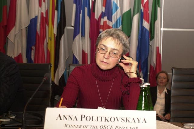 Anna Politkovskaya receiving the OSCE Prize for Journalism and Democracy at OSCE Parliamentary Assembly's Winter Meeting in Vienna, 2003
