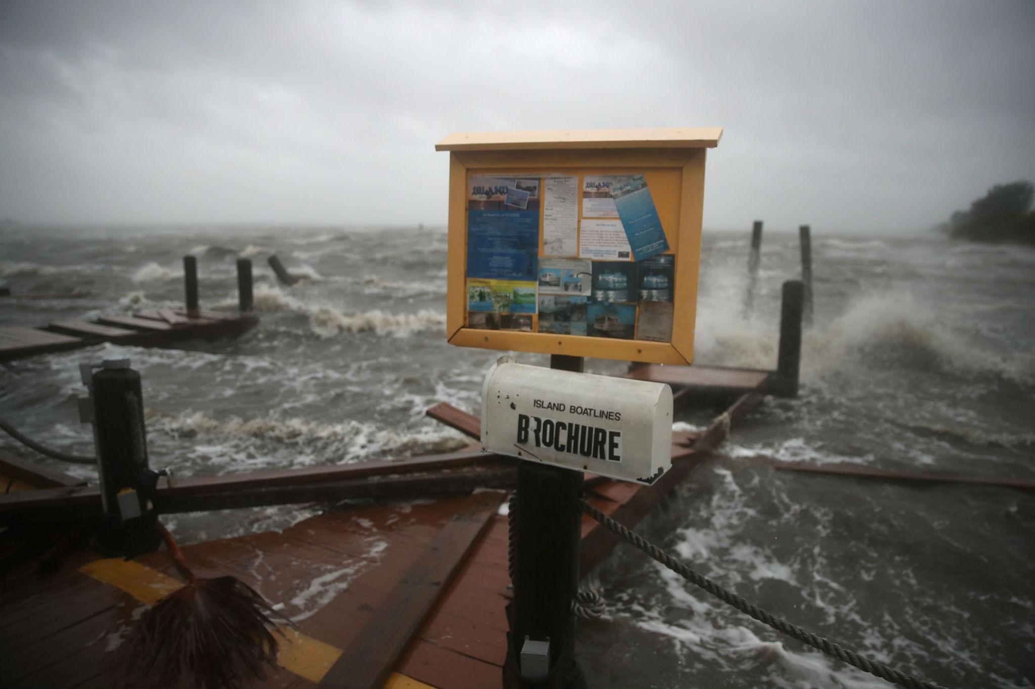 Heavy waves caused by Hurrican Matthew pound the boat docks at Cocoa Beach, Florida