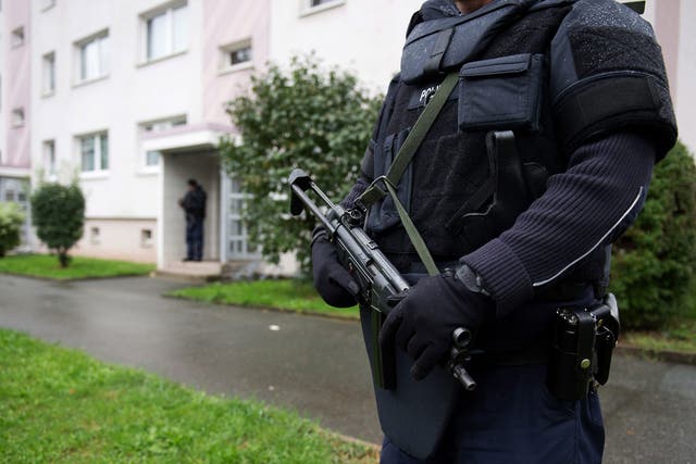Police officers secure a residential area in Chemnitz,  Germany, on 8 October