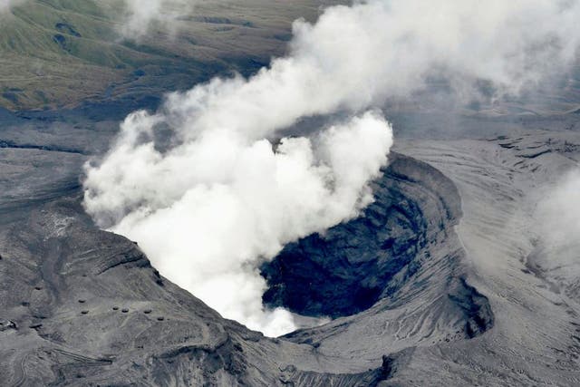 An aerial view shows the eruption of Mount Aso in Aso, Kumamoto prefecture, southwestern Japan