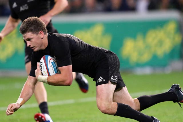 Beuden Barrett scores one of New Zealand's nine tries against South Africa