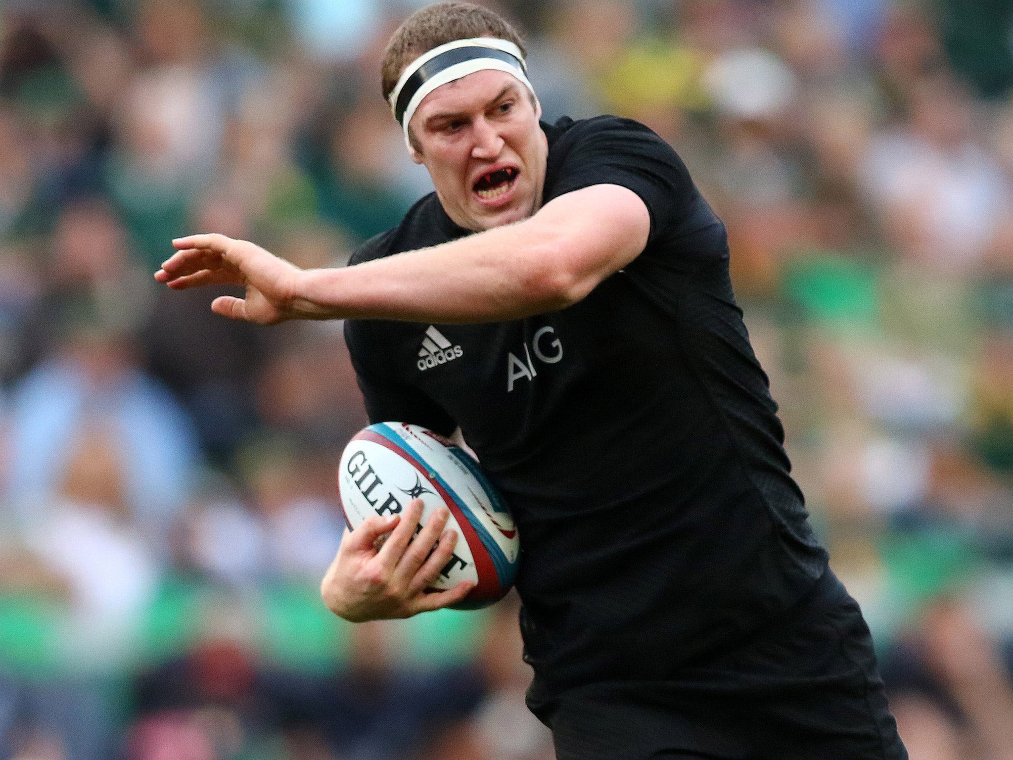 Brodie Retallick carries the ball forward for New Zealand