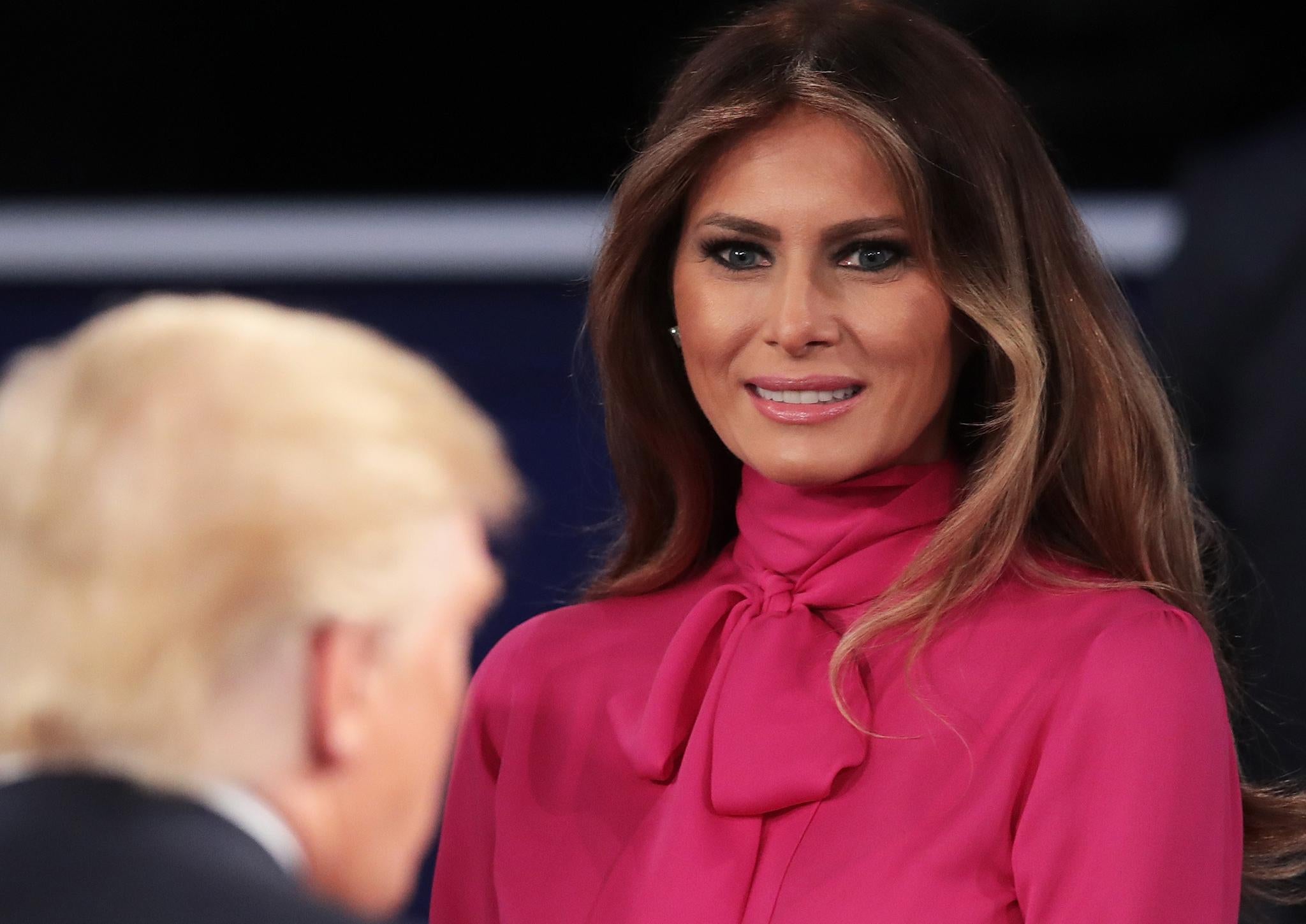 Melania Trump greets her husband Republican presidential nominee Donald Trump after the town hall debate at Washington University on October 9, 2016