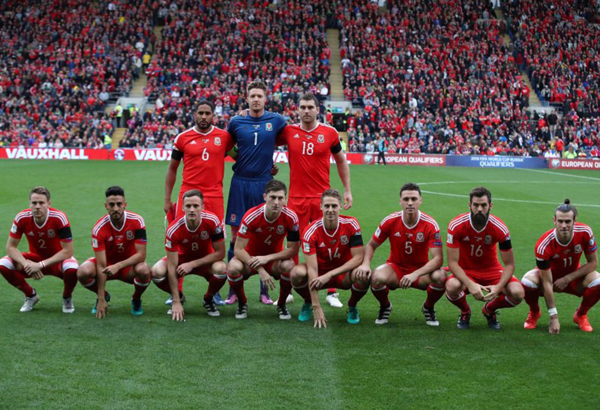 Wales line up for a squad photo before their match against Georgia