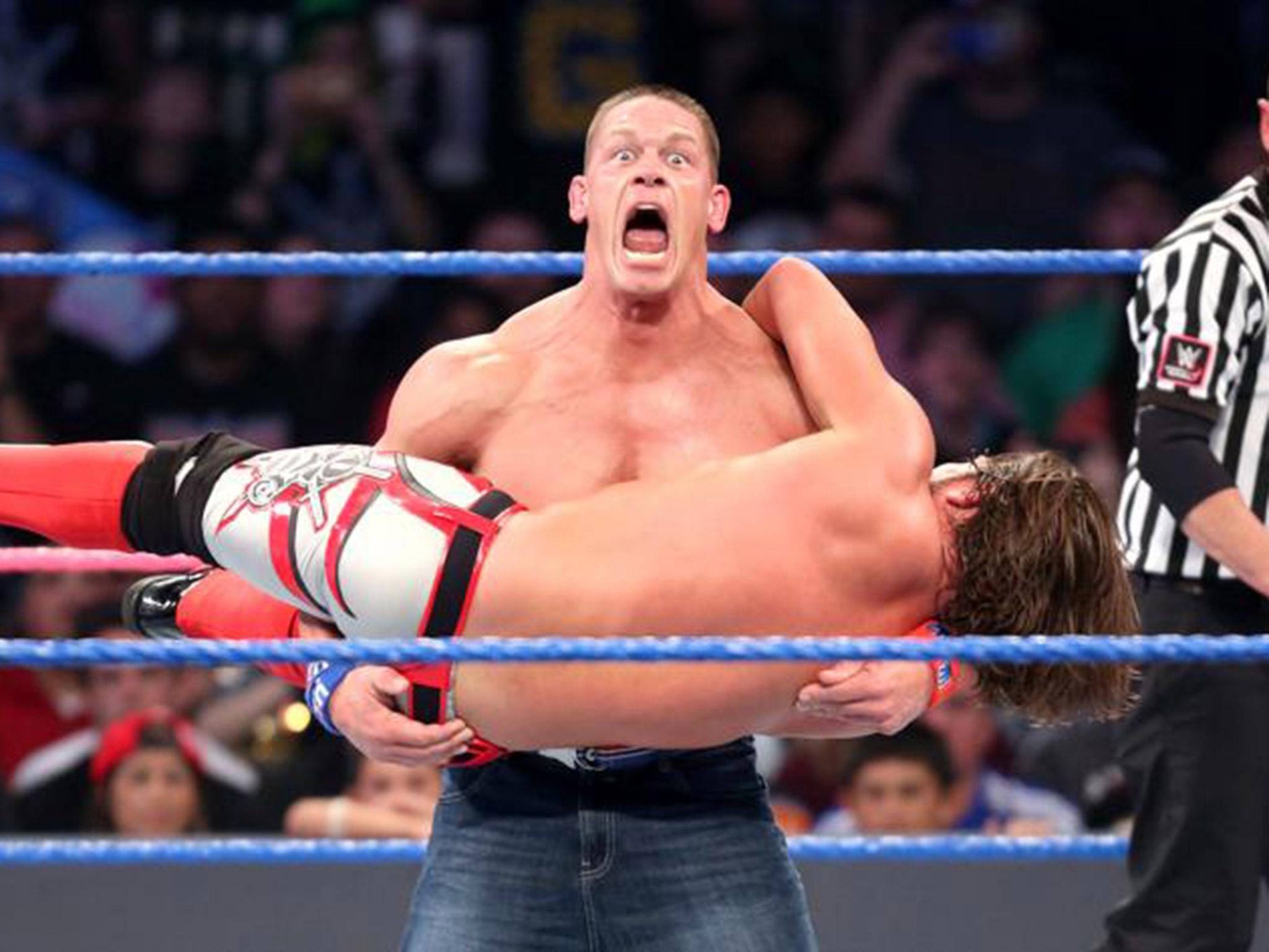 &#13;
Cena hoists Styles up for an Attitude Adjustment &#13;