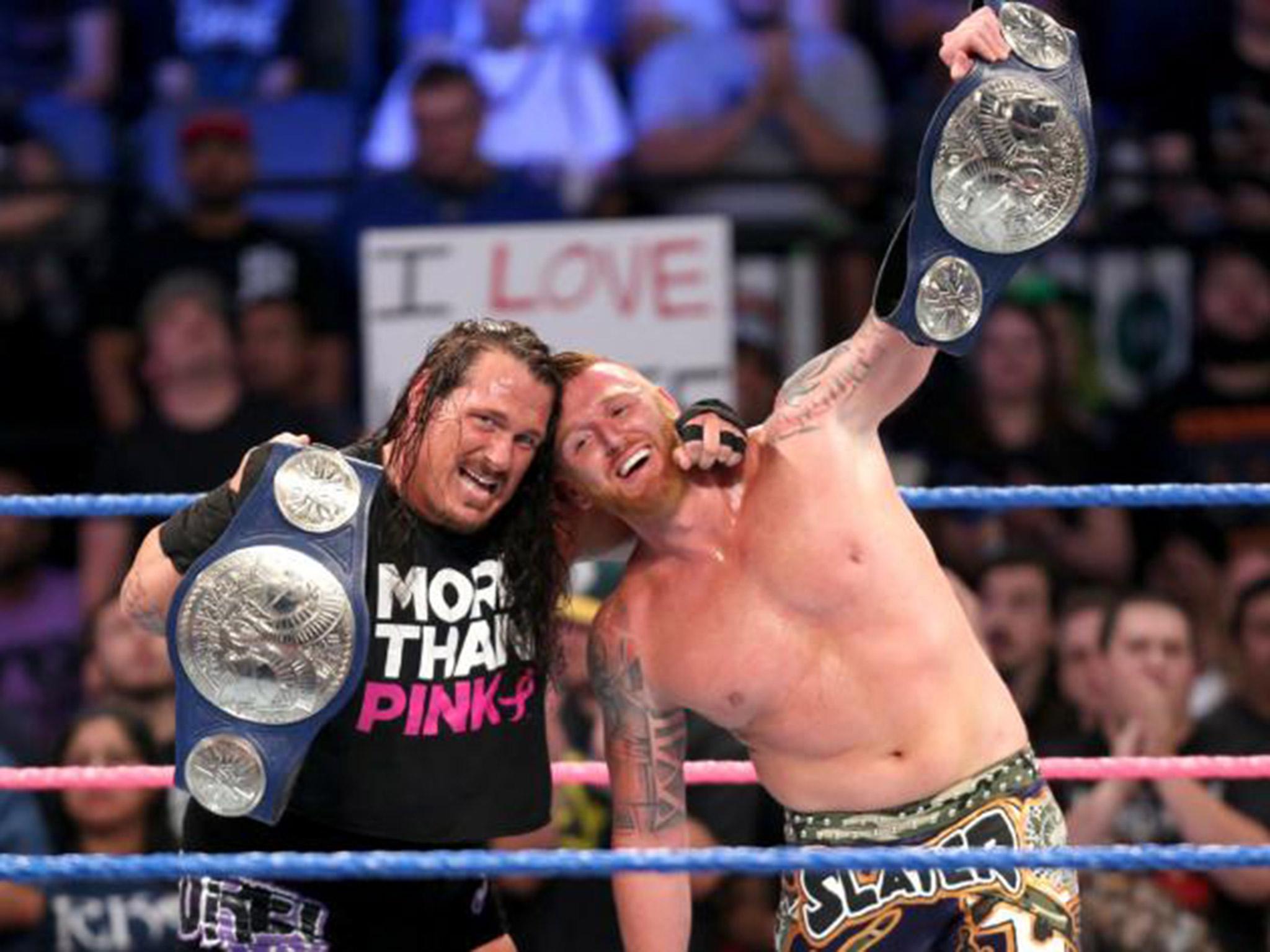 Rhyno on the left, after a fight in the WWE, alongside fellow wrestler Heath Slater