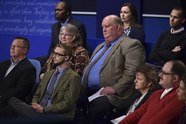 Members of the audience – including Ken Bone, bottom right – listen to the second presidential debate