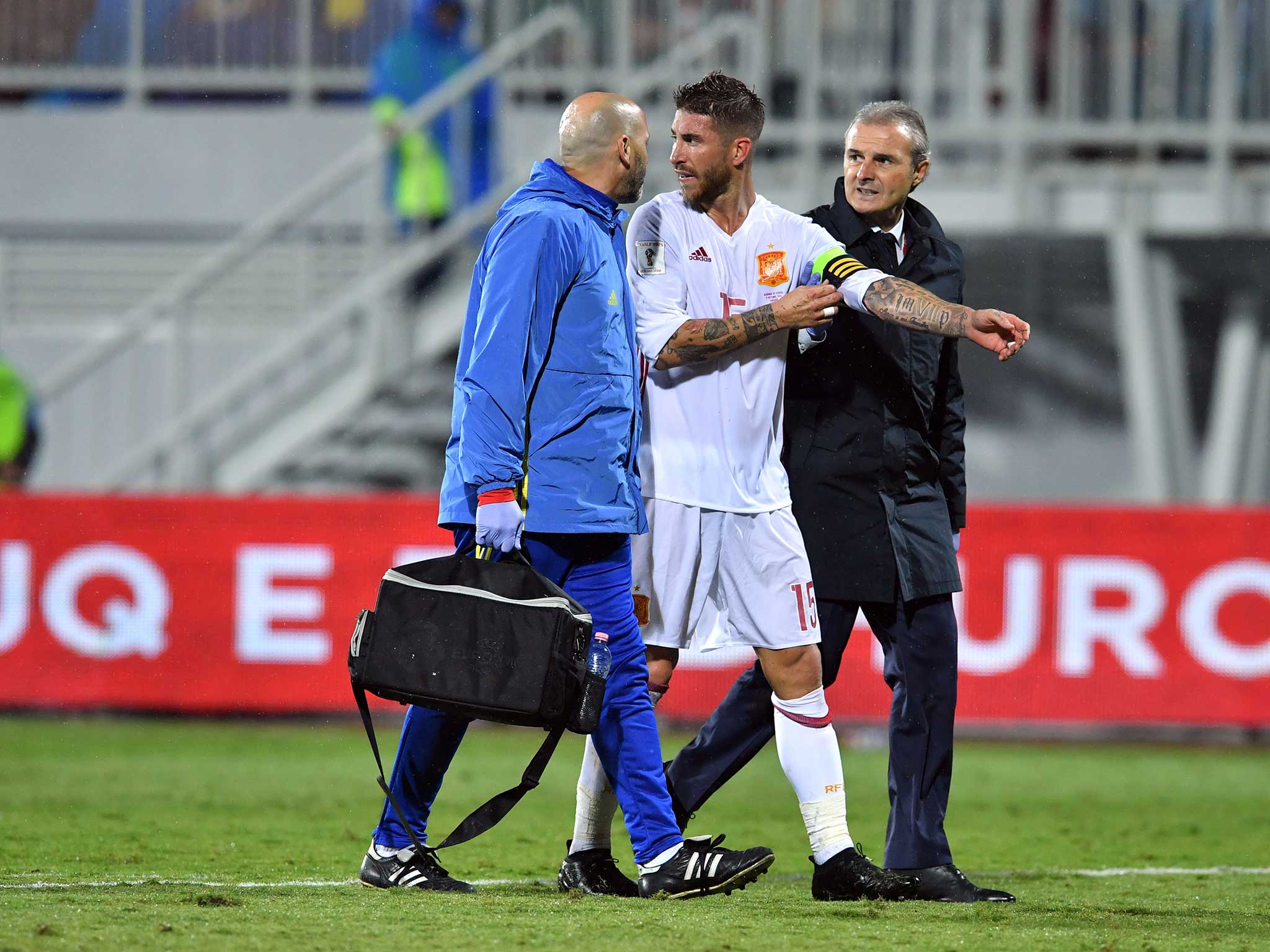 Sergio Ramos is led off the pitch after suffering an injury for Spain