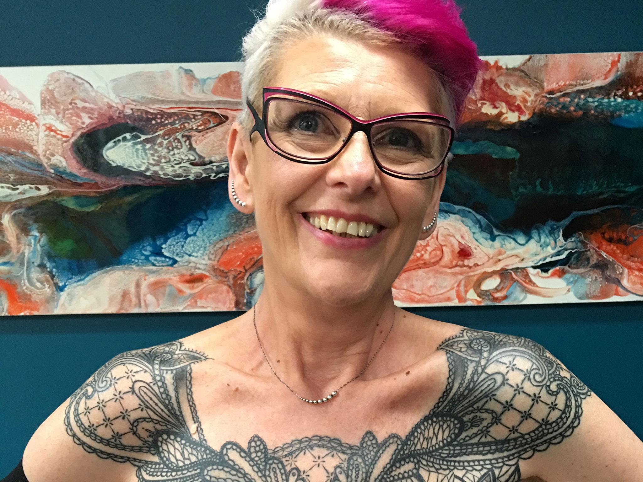 I've regained control over my body': Woman gets chest tattoo to cover mastectomy scars