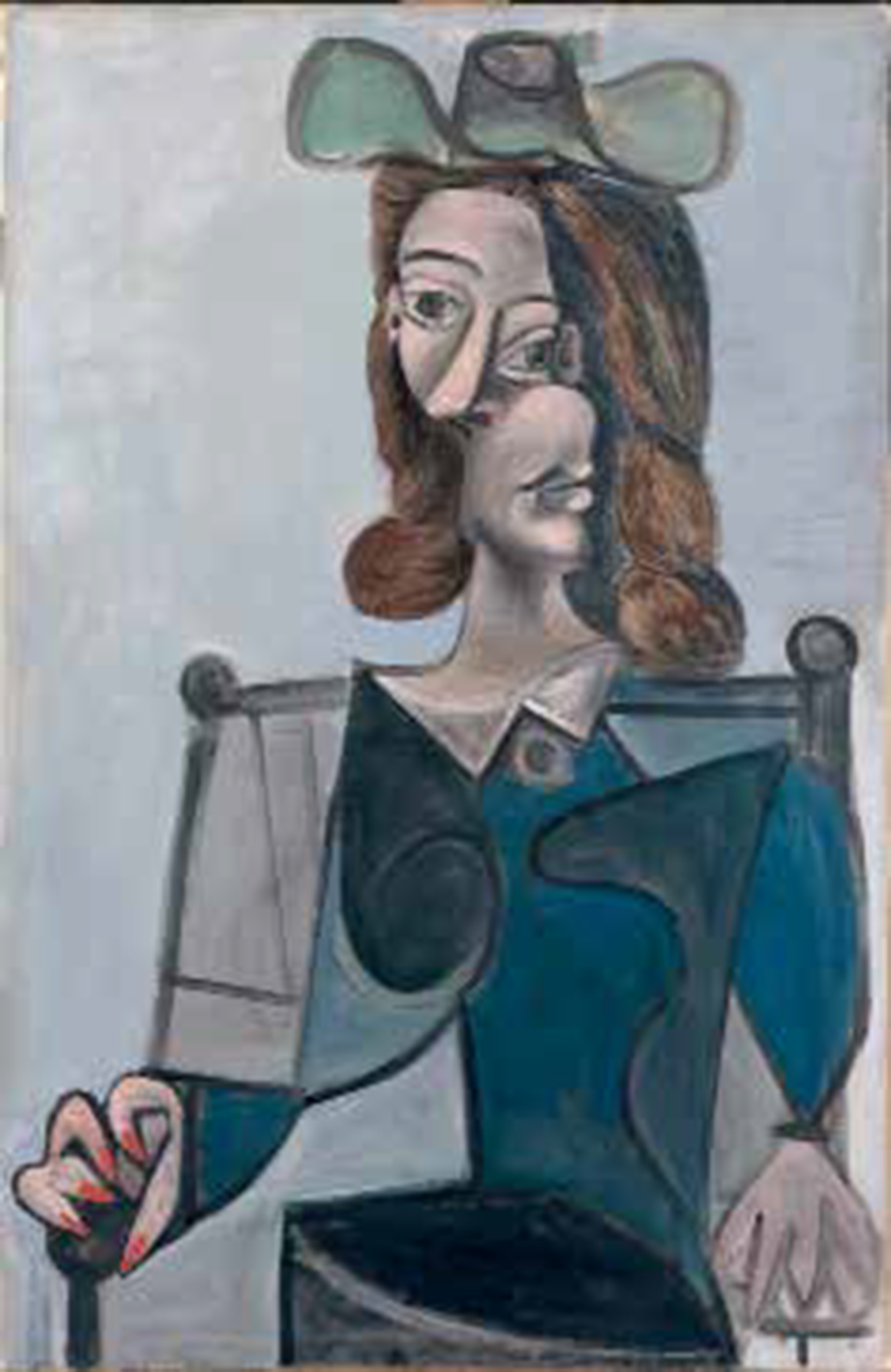 Picasso painted ‘Woman in a Hat’ in June 1941, almost exactly a year after the Nazi occupation of Paris began (Jean-Gilles Berizzi/Succession Picasso/DACS)