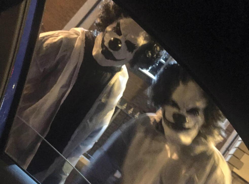 Two clowns allegedly carrying machetes were photographed approaching Kurtis Mulvaney’s car in Manchester