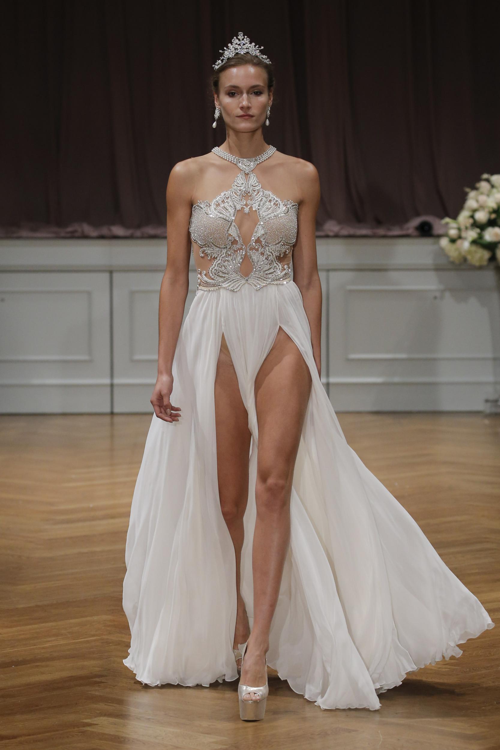 The designer's Venus dress showcases a flowing white skirt with two hip-high slits