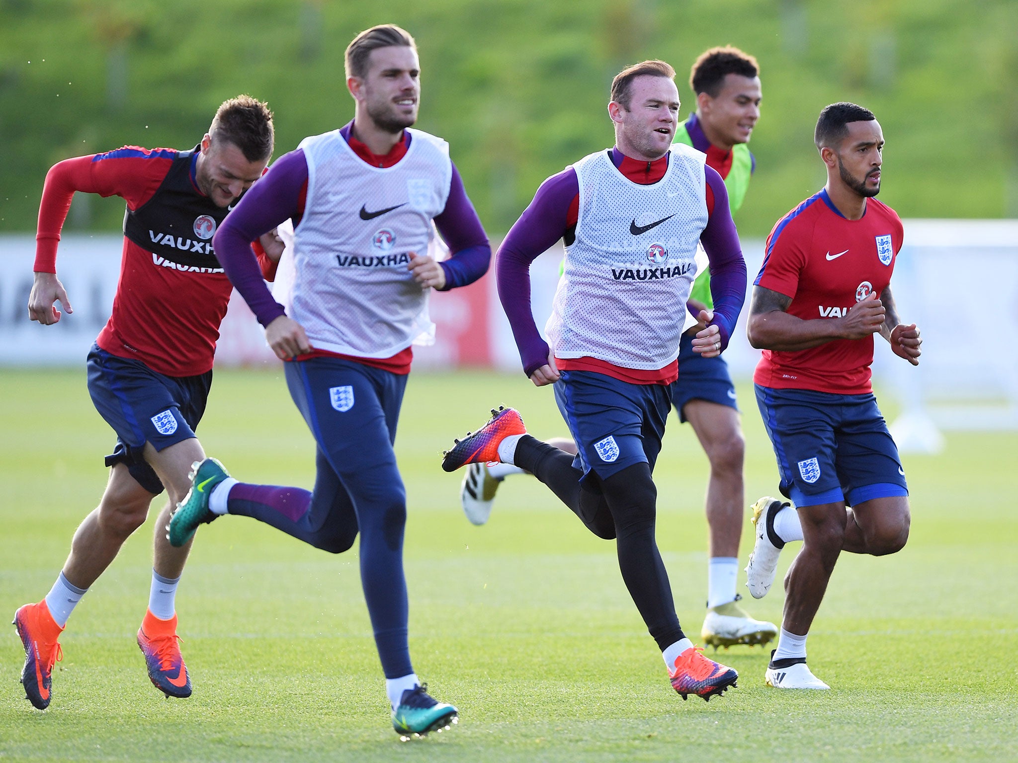Jordan Henderson and Wayne Rooney in training ahead of Tuesday night's World Cup qualifier