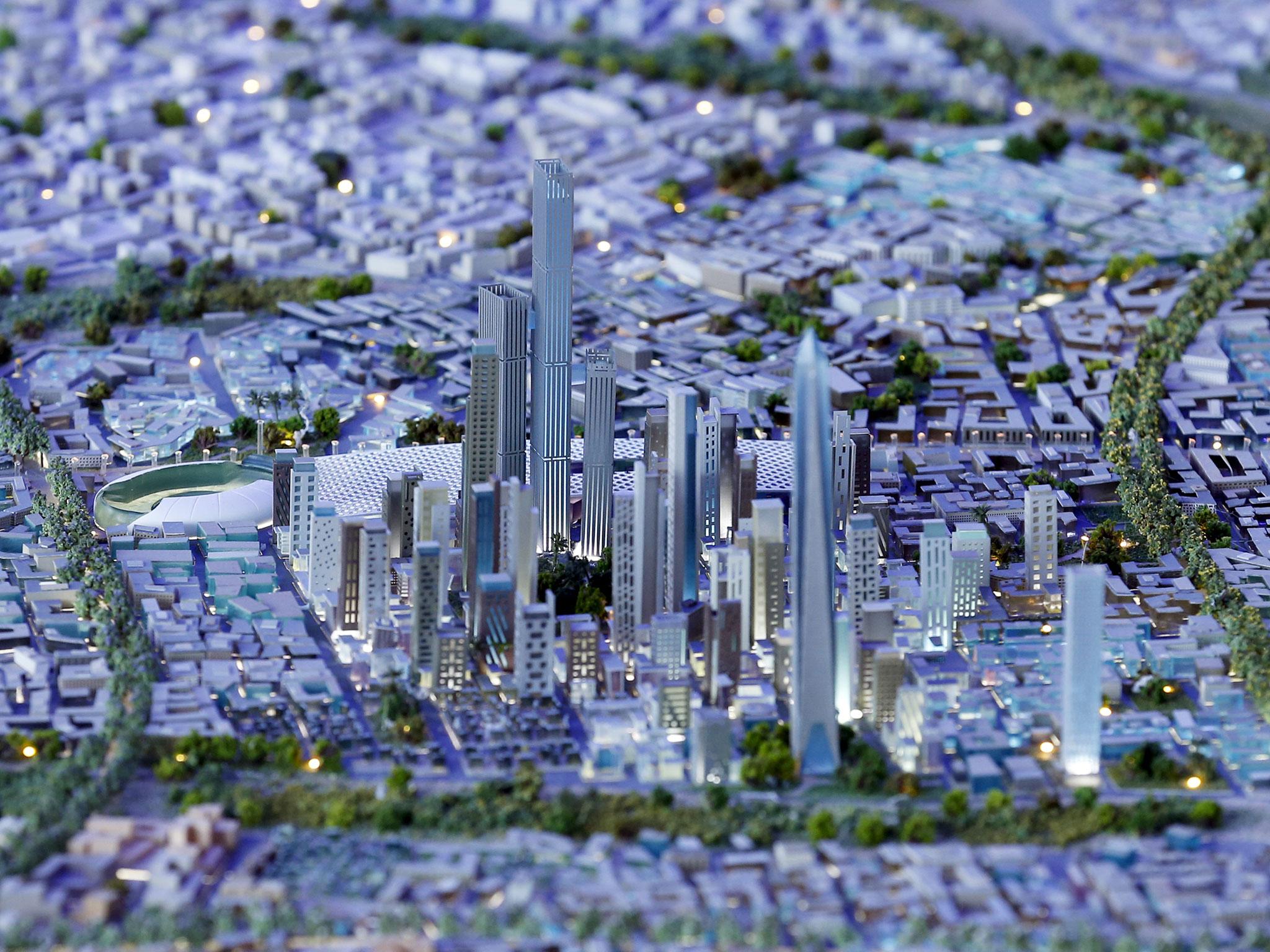 A model of a planned new capital for Egypt is displayed for investors during the final day of Egypt Economic Development Conference (EEDC) in Sharm el-Sheikh, in the South Sinai governorate, south of Cairo, 28 March, 2015