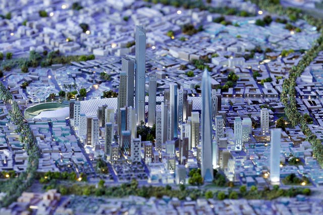 A model of a planned new capital for Egypt is displayed for investors during the final day of Egypt Economic Development Conference (EEDC) in Sharm el-Sheikh, in the South Sinai governorate, south of Cairo, 28 March, 2015