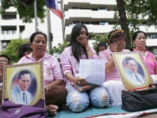 King of Thailand: Well-wishers wearing pink gather in Bangkok to pray for ailing Bhumibol Adulyadej