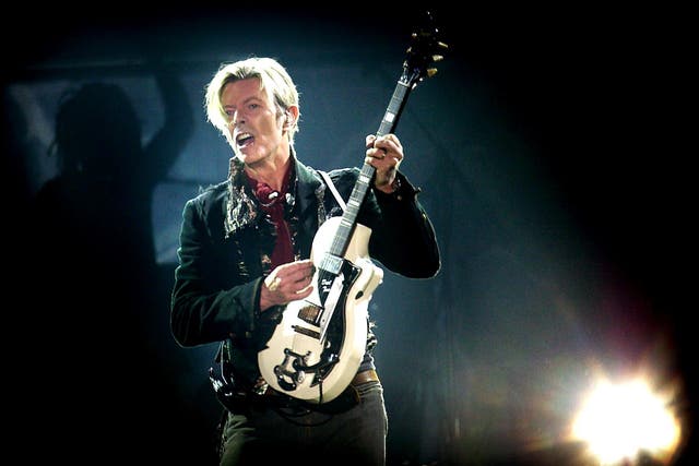 David Bowie performs on stage at the Forum in Copenhagen October 7. 2003.