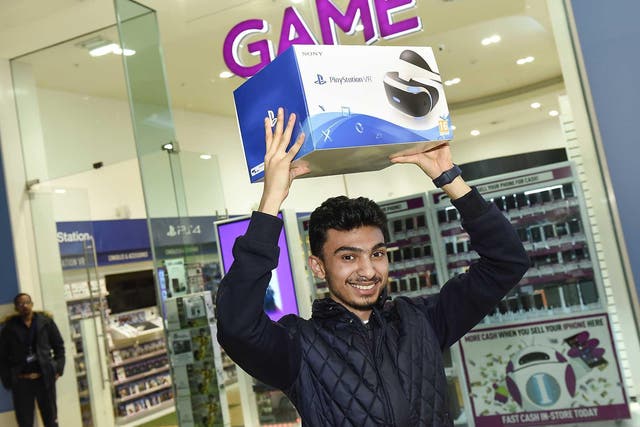 An elated customer at the launch of PlayStation VR at the GAME Digital Westfield White City midnight launch.
