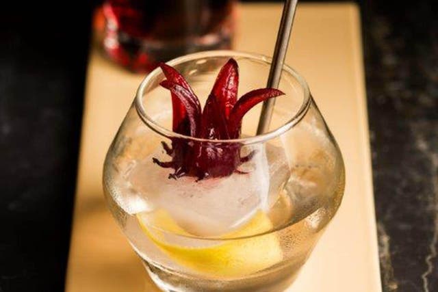Top the hibiscus spritz cocktail up with prosecco for extra fizz