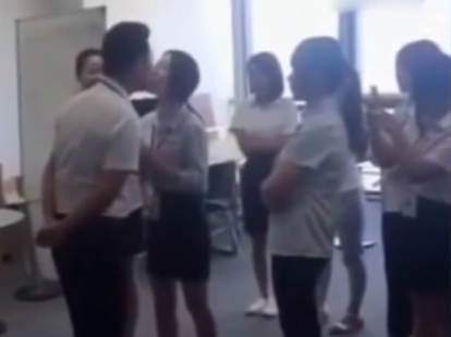Mystery over video showing female workers forced to kiss male boss every morning The Independent The Independent
