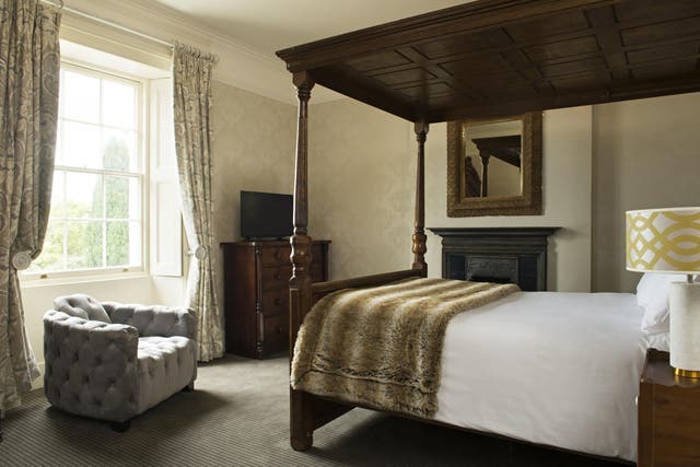 The 22 bedrooms are spread across the main house and the renovated outbuildings, with a mix of grand king-size four-poster rooms and slightly more modern compact doubles