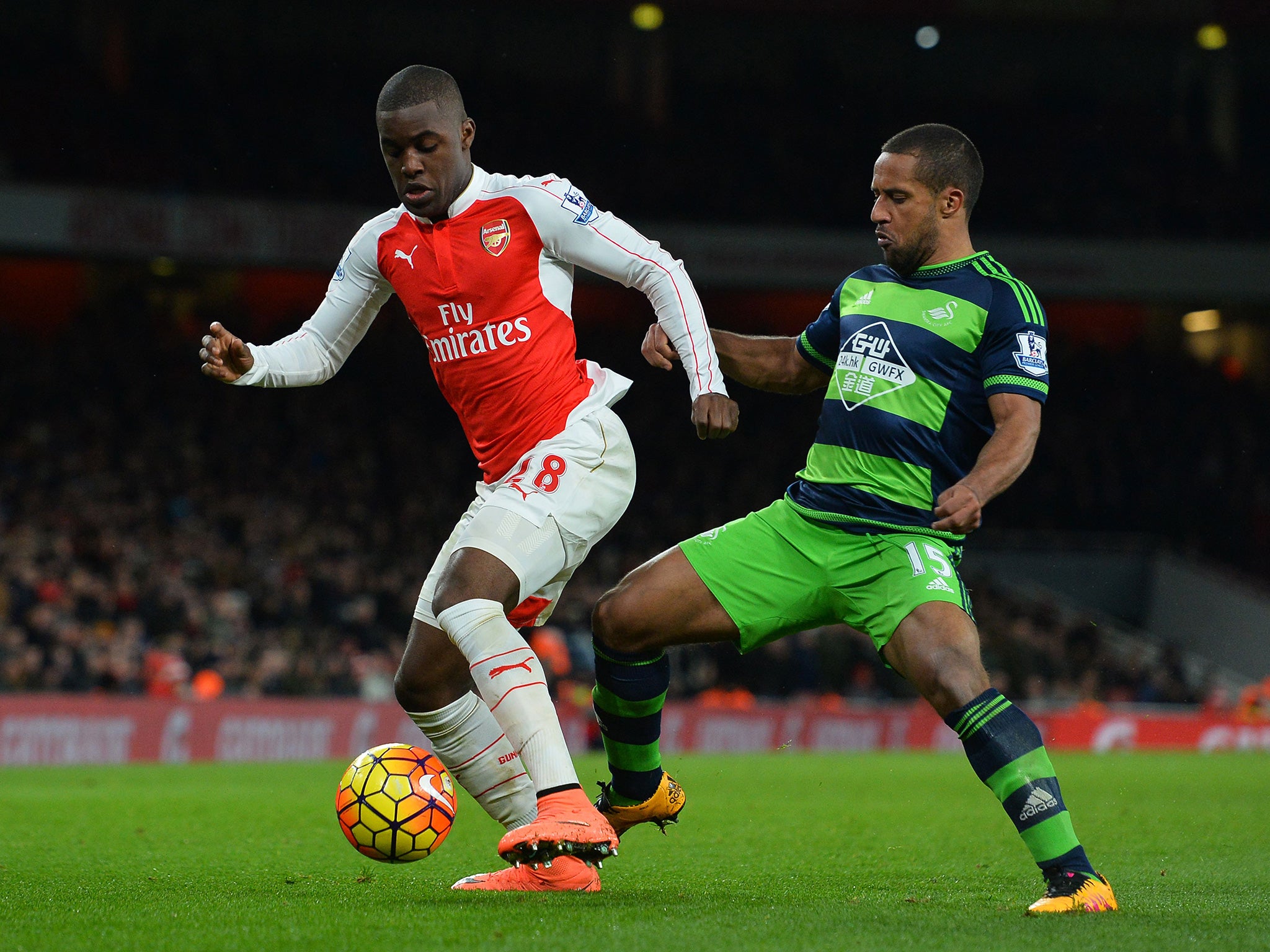 Campbell and Routledge battle for the ball during last season's corresponding fixture