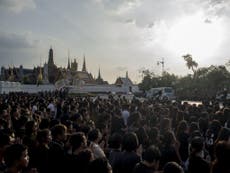 Thousands gather to say goodbye to Thai King Bhumibol Adulyadej as motorcade enters palace