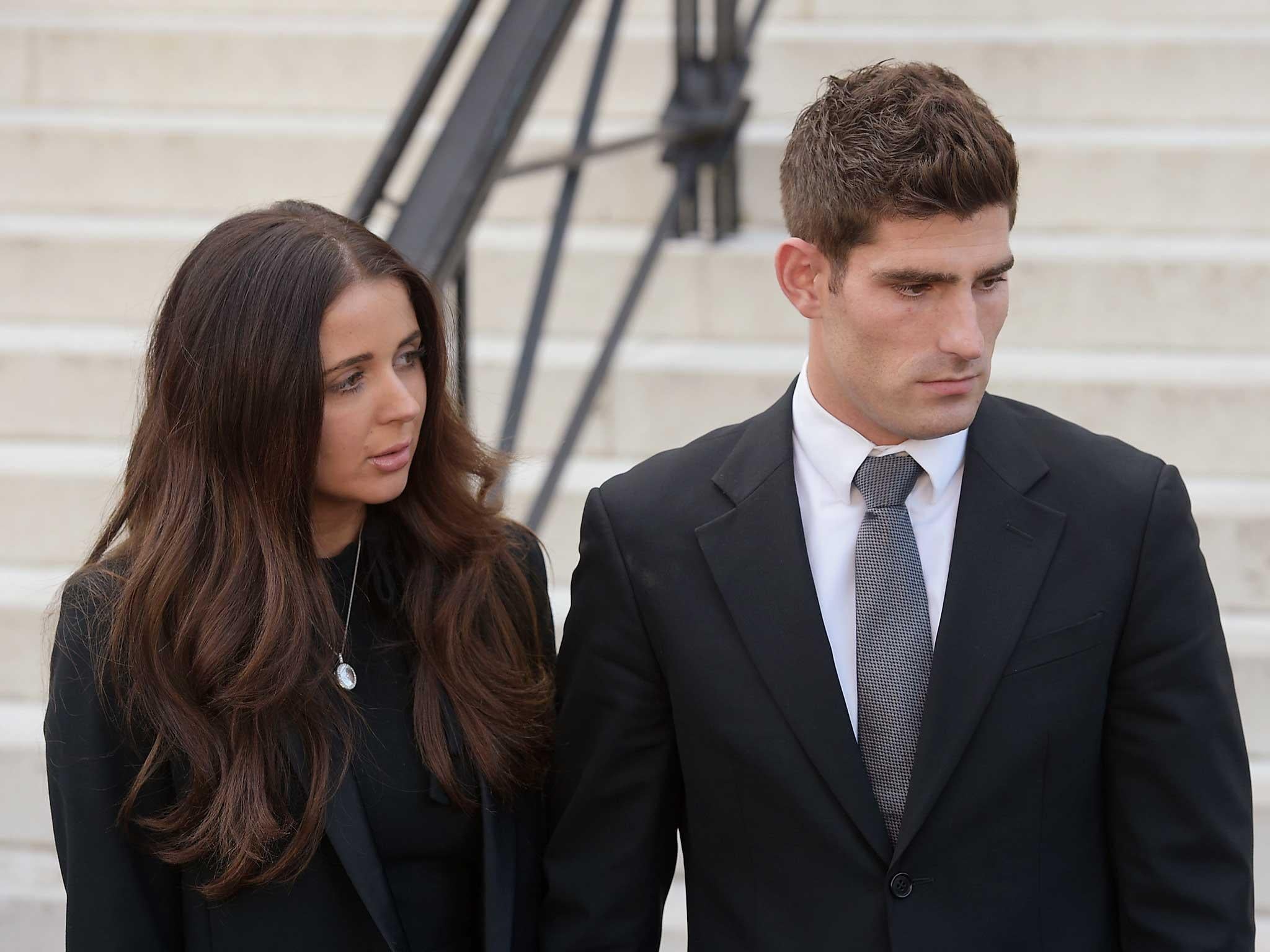 Footballer Ched Evans and partner Natasha Massey outside Cardiff Crown Court, where he has been found not guilty of raping a teenager in a hotel in north Wales following a two week retrial