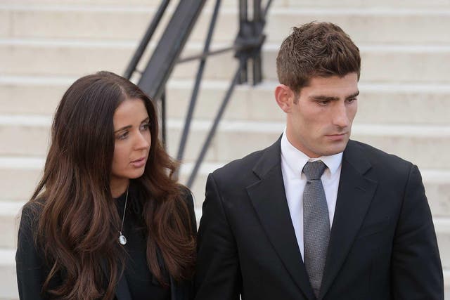 Footballer Ched Evans and partner Natasha Massey outside Cardiff Crown Court, where he has been found not guilty of raping a teenager in a hotel in north Wales following a two week retrial
