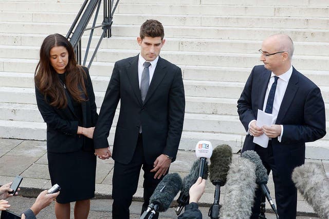 Footballer Ched Evans and partner Natasha Massey with solicitor Shaun Draycott outside Cardiff Crown Court
