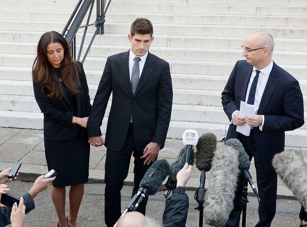 Footballer Ched Evans and partner Natasha Massey with solicitor Shaun Draycott outside Cardiff Crown Court