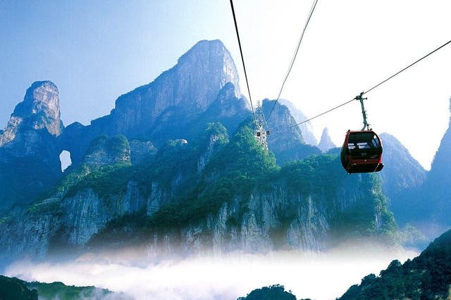 China's Tianmen Shan Cable Car journeys through misty, mystical mountains