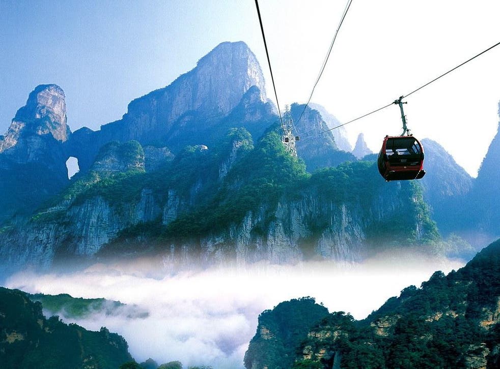 China's Tianmen Shan Cable Car journeys through misty, mystical mountains