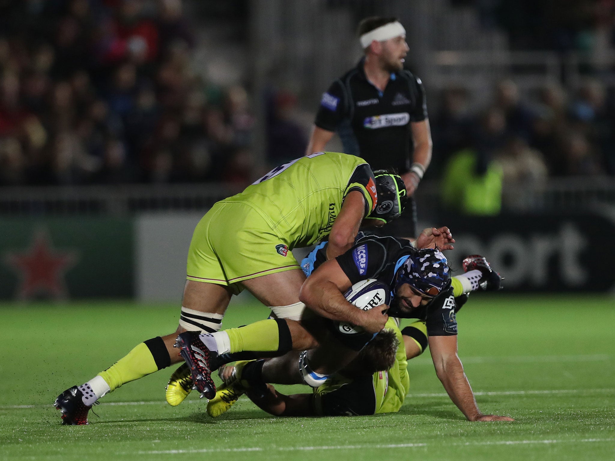 Ed Slater tackles Glasgow's Josh Strauss during Friday night's encounter