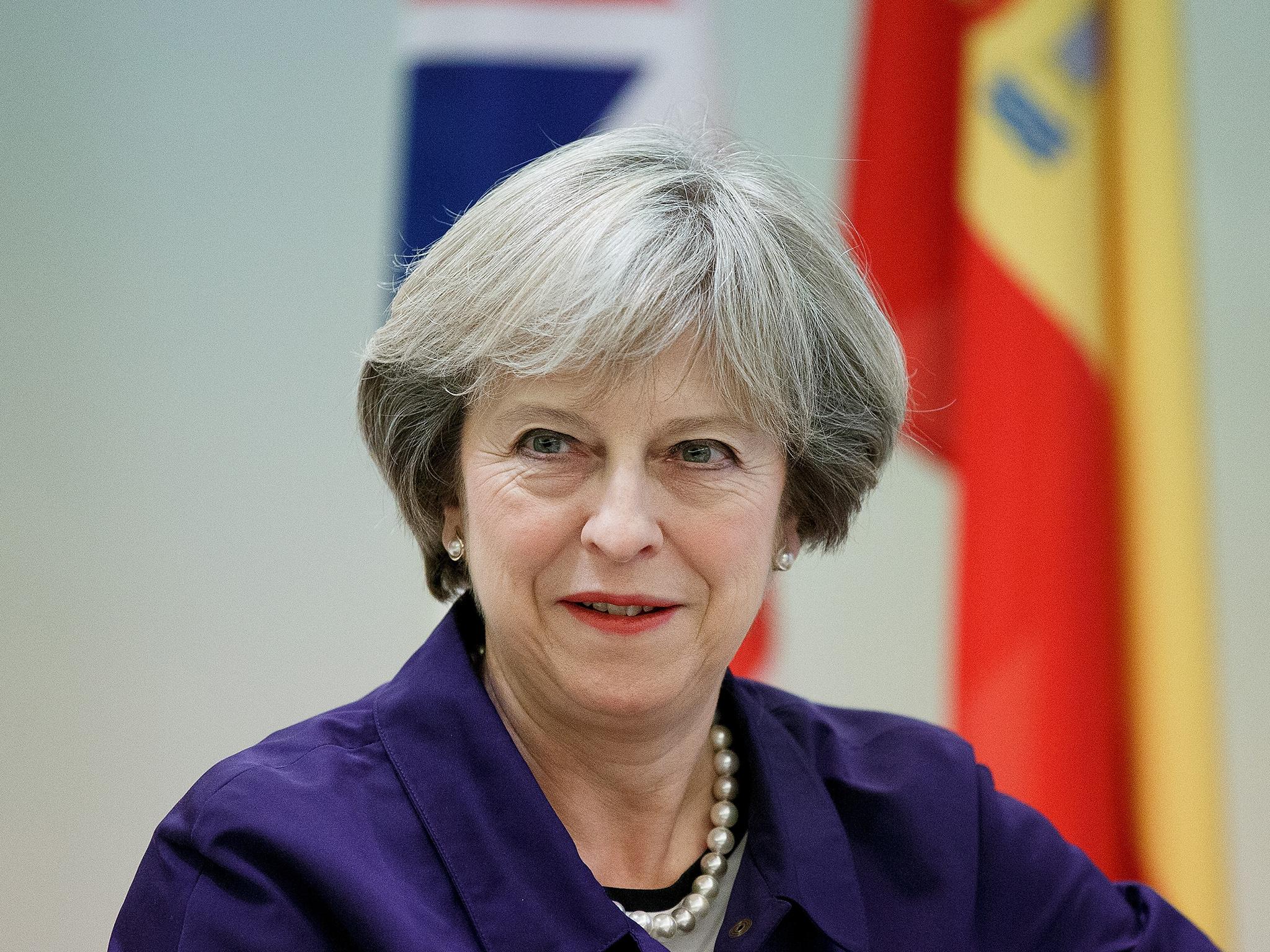 Theresa May has refused to guarantee EU nationals' rights, insisting the Government must not “reveal its hand”