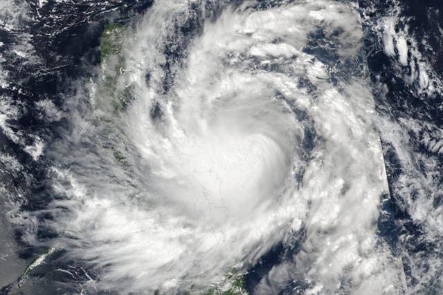 Typhoon Sarika approaches the Philippines