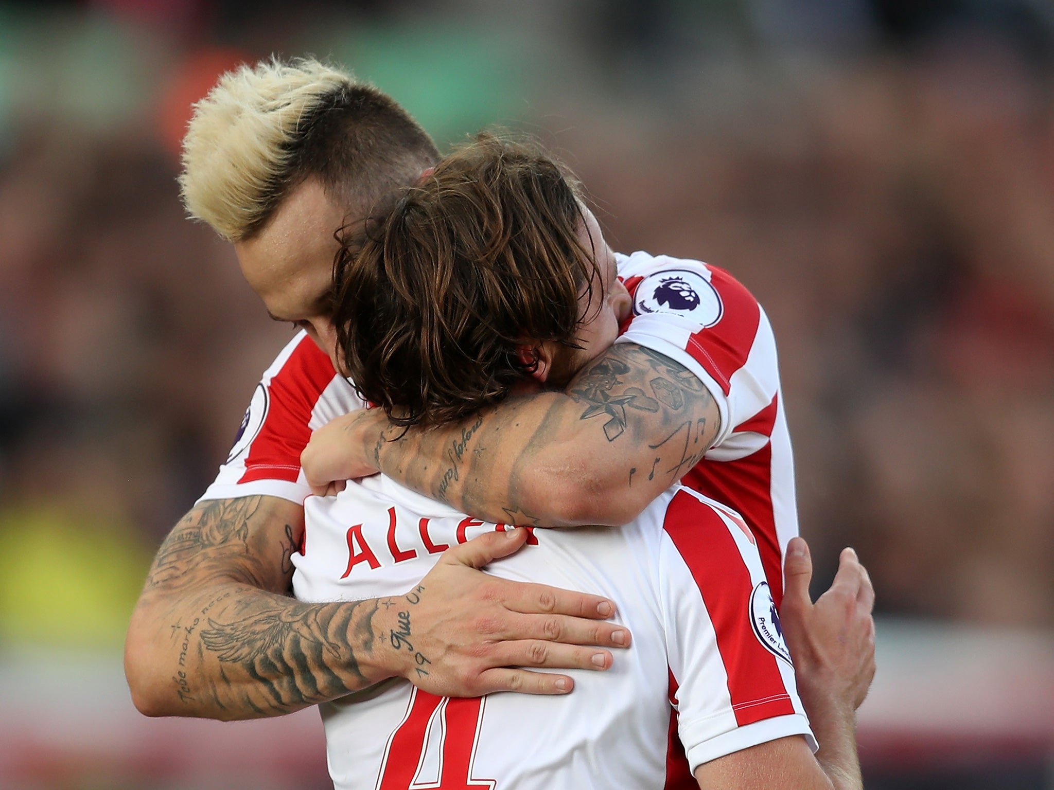 Arnautovic embraces goalscorer Allen after his second strike