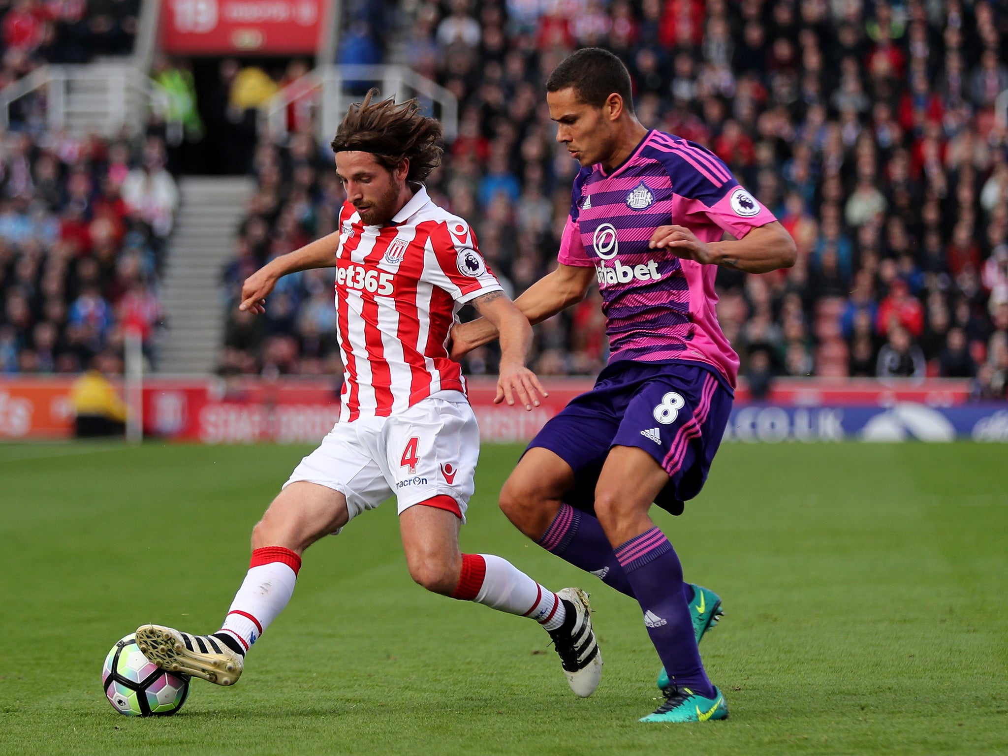 Allen battles for the ball with Sunderland's Rodwell