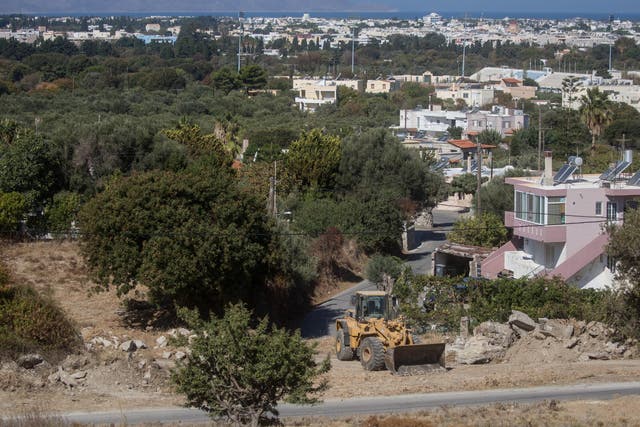 Officers and Greek volunteers had been excavating land around an old farmhouse on Kos, where the toddler was last seen