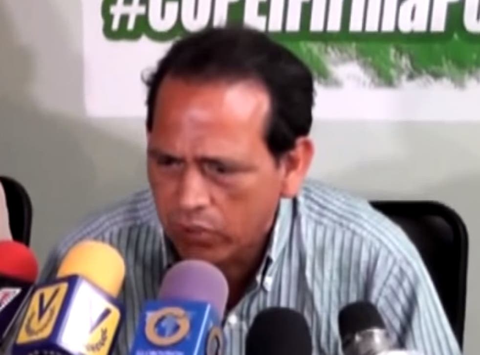 Juan Carlos Herrera speaking to reporters on Monday after visiting the prison